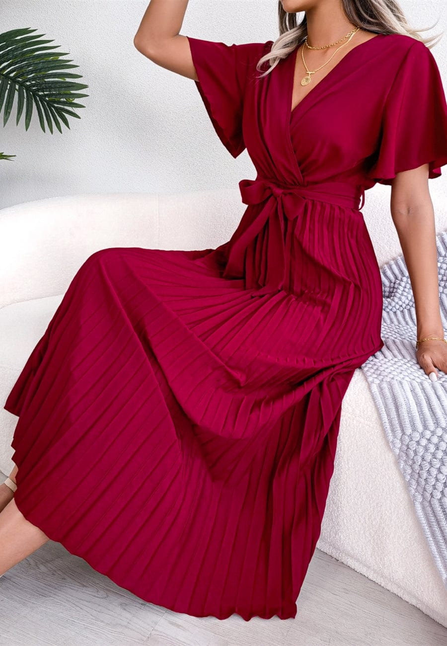 Vestido cruzado plisado con mangas abullonadas 