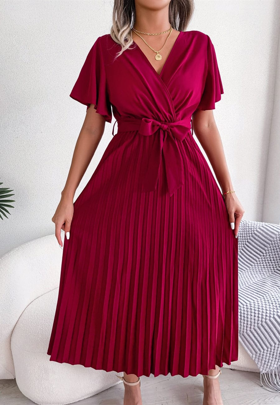 Vestido cruzado plisado con mangas abullonadas 