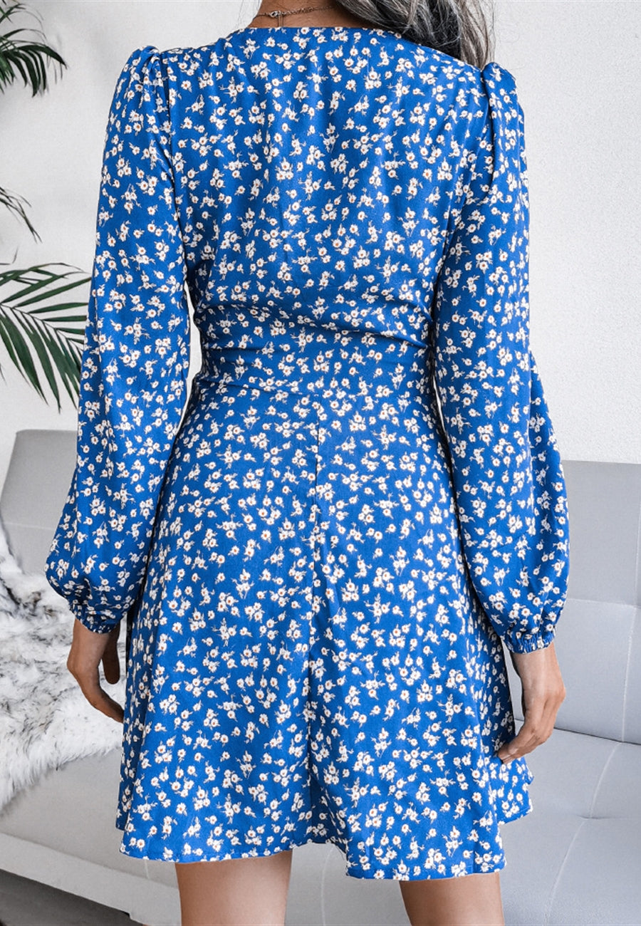 Vestido de manga larga con escote pronunciado y estampado floral