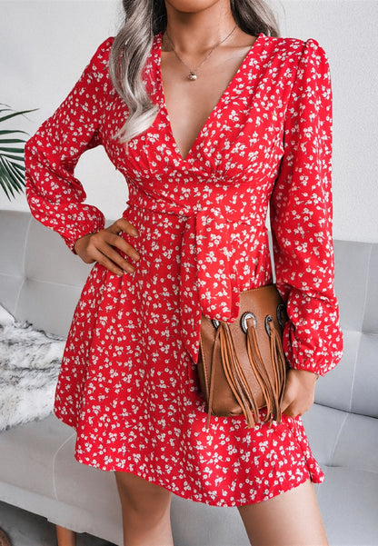 Vestido de manga larga con escote pronunciado y estampado floral