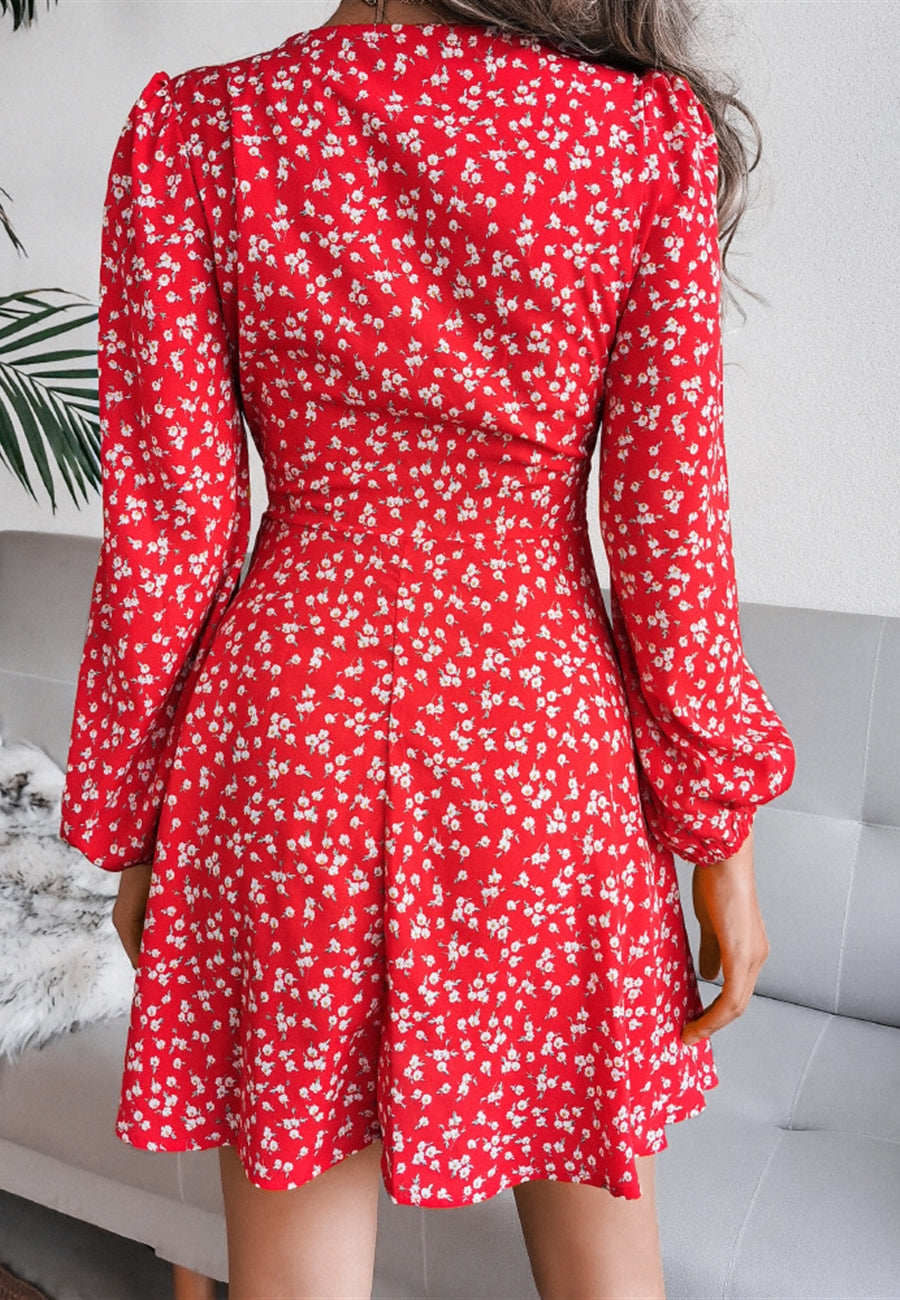 Vestido de manga larga con escote pronunciado y estampado floral