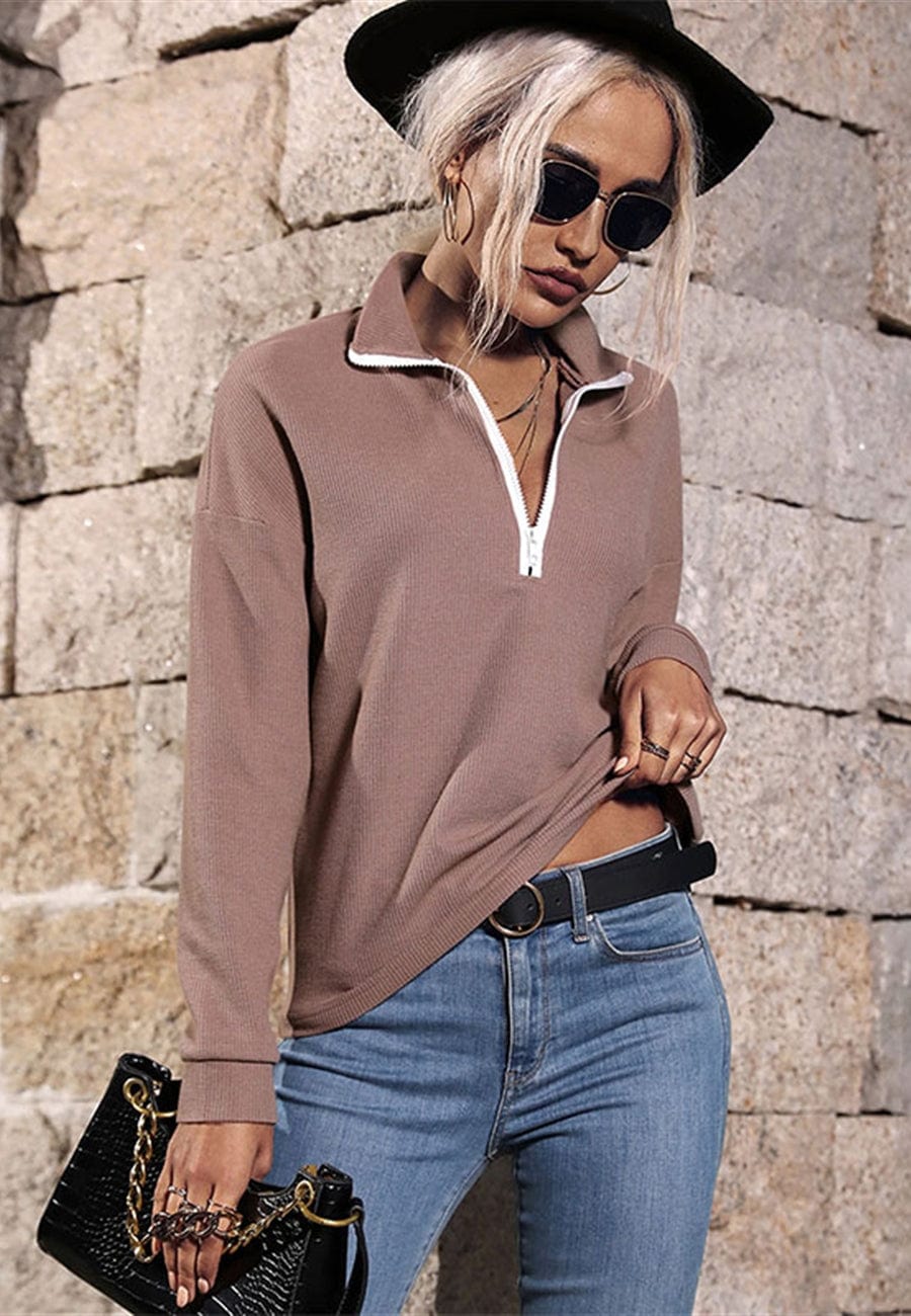 Suéter de punto con cremallera en contraste