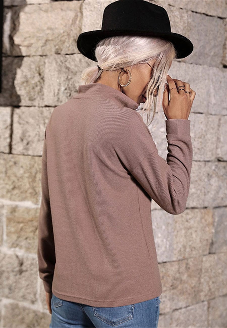 Suéter de punto con cremallera en contraste