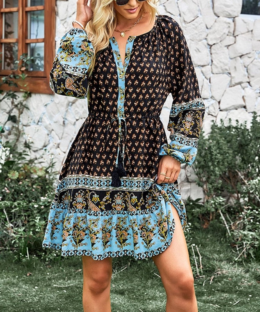 Vestido bohemio con cintura con lazo y borlas 