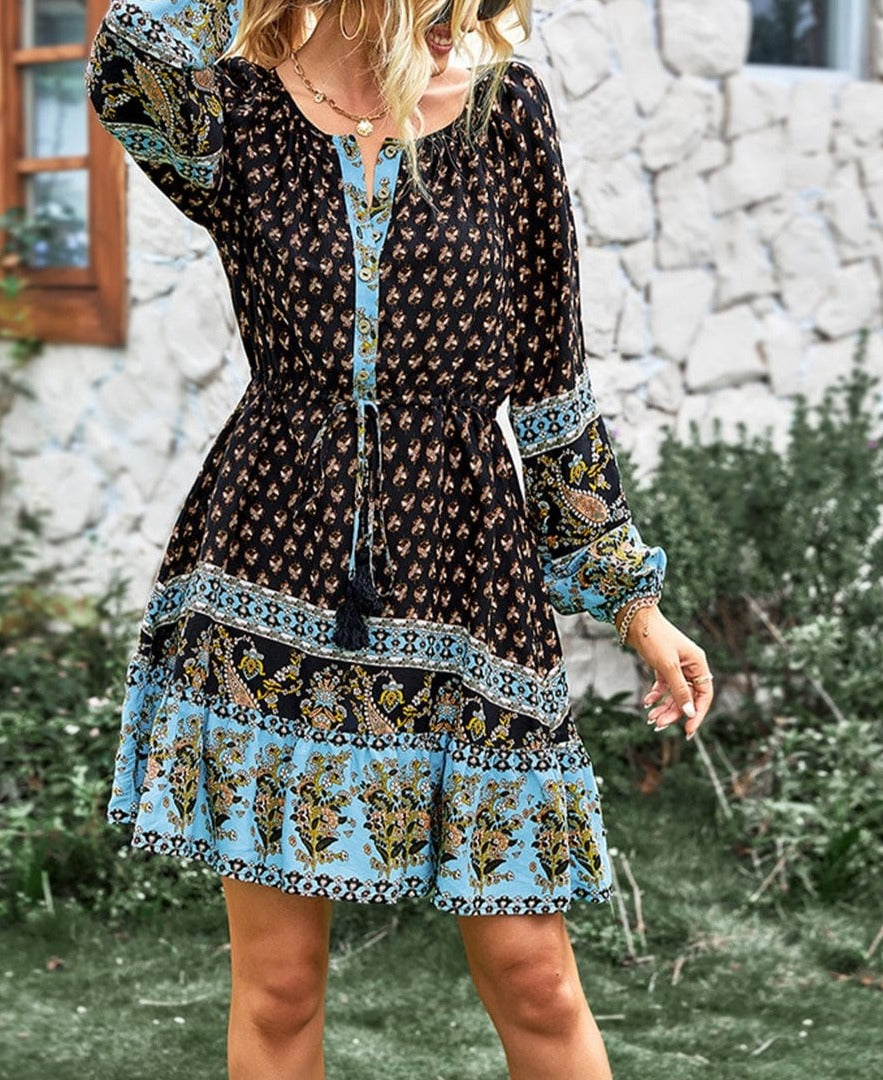 Vestido bohemio con cintura con lazo y borlas 