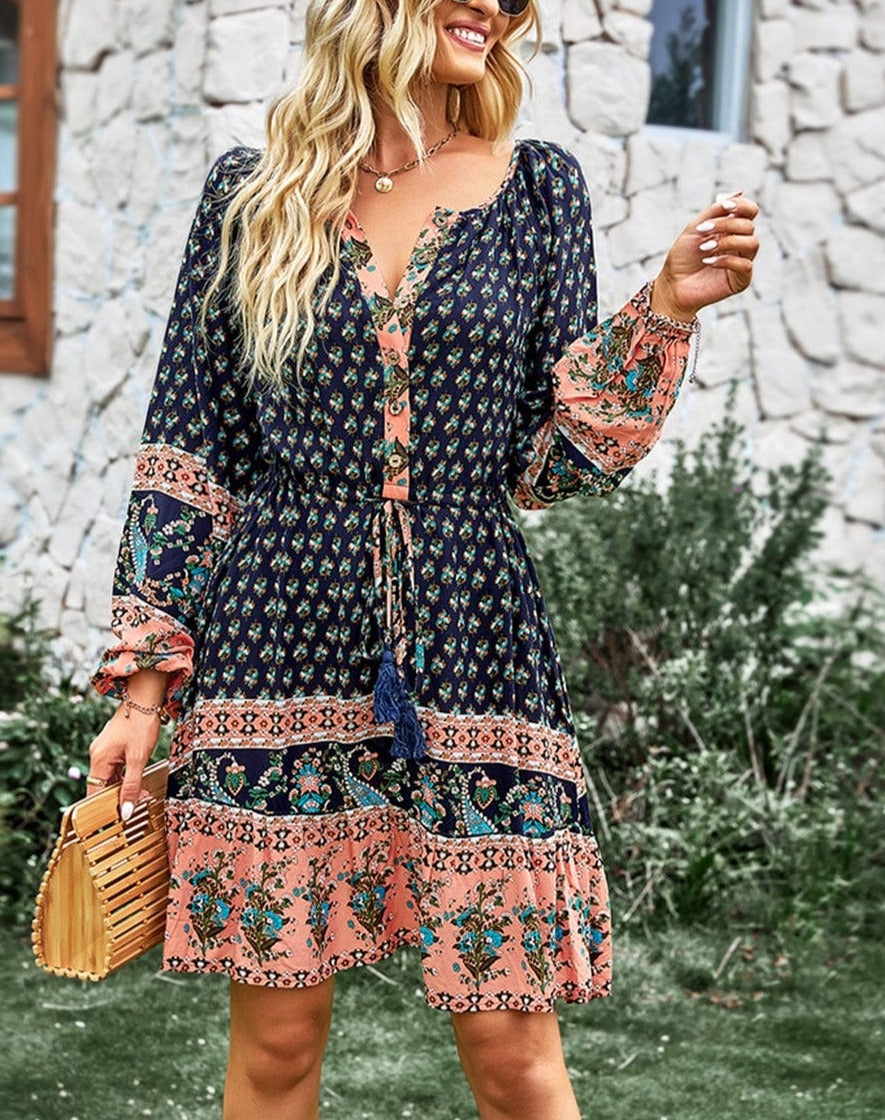 Vestido bohemio con cintura con lazo y borlas 