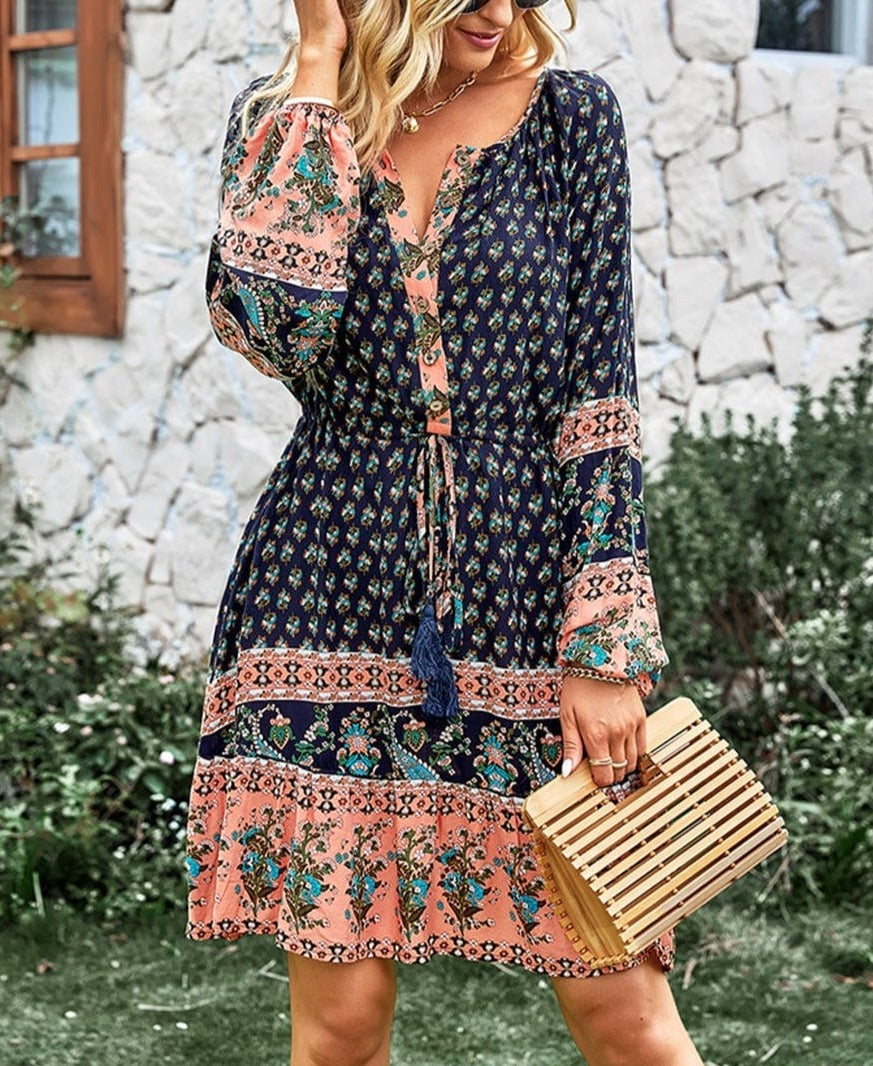 Vestido bohemio con cintura con lazo y borlas 