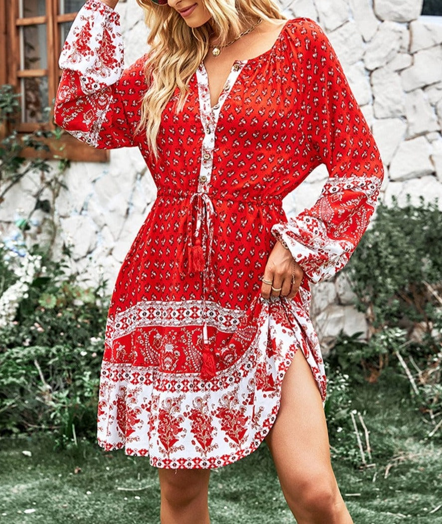 Vestido bohemio con cintura con lazo y borlas 