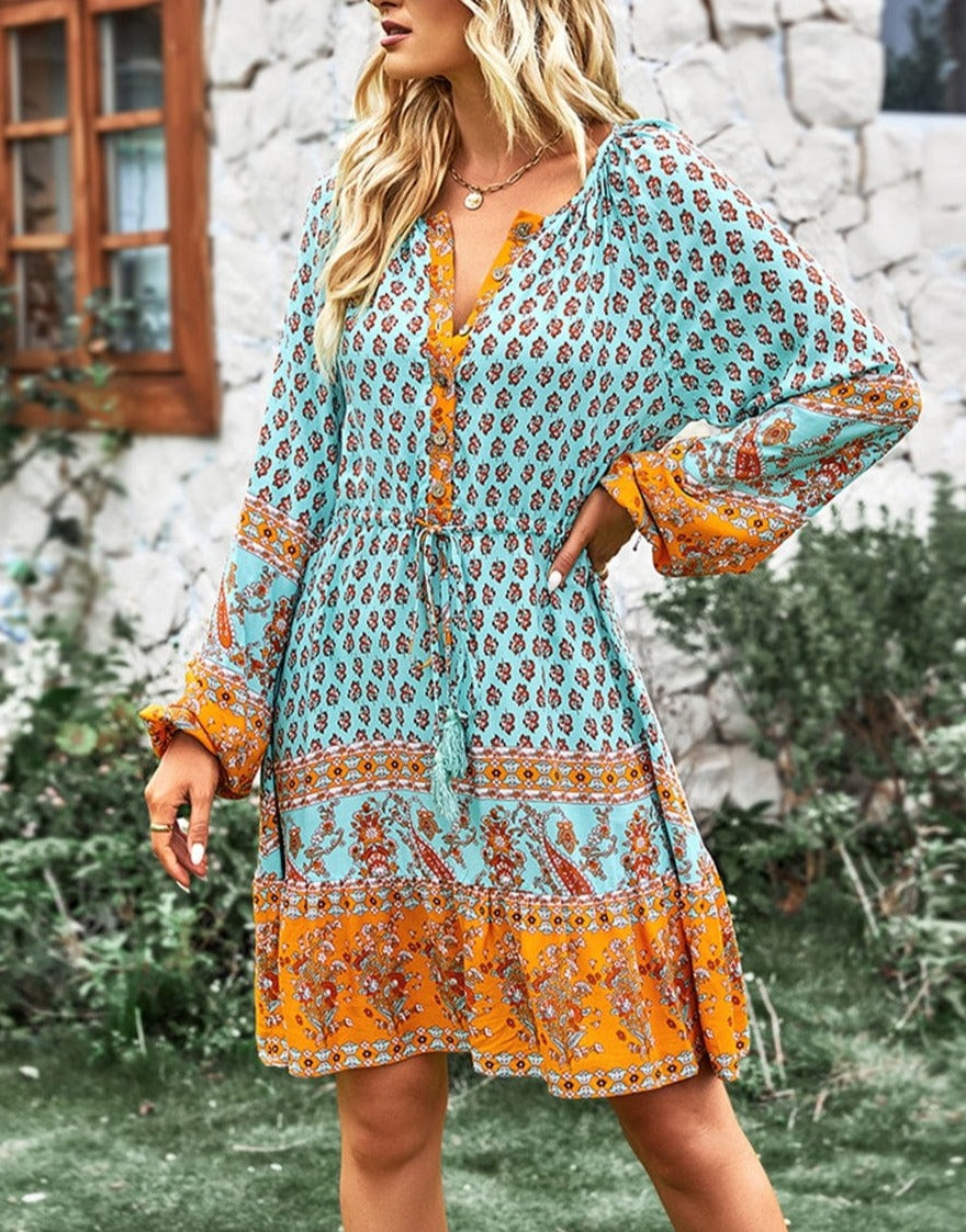 Vestido bohemio con cintura con lazo y borlas 