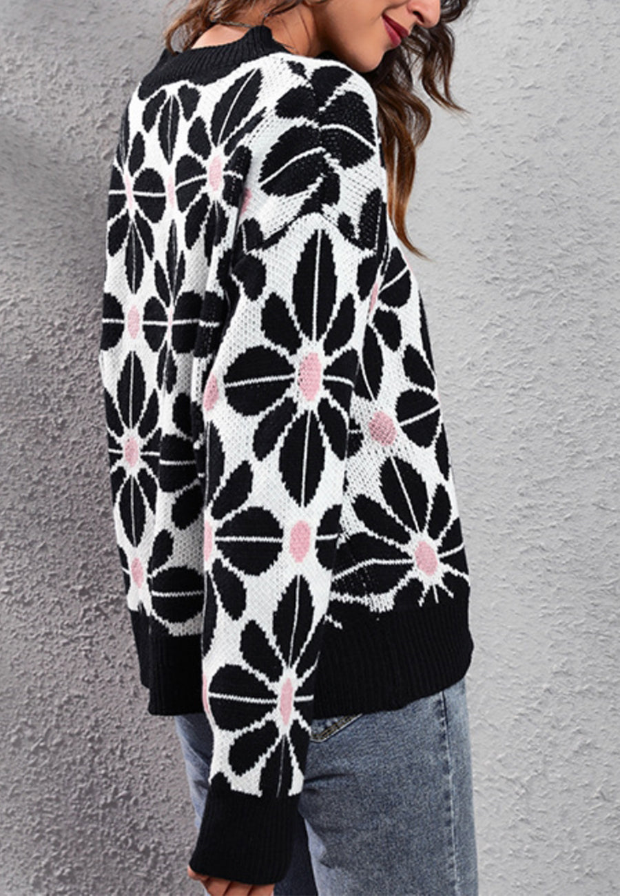 Suéter con estampado floral geométrico