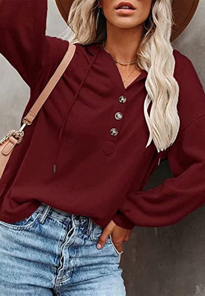 Sudadera con capucha y detalle de botones