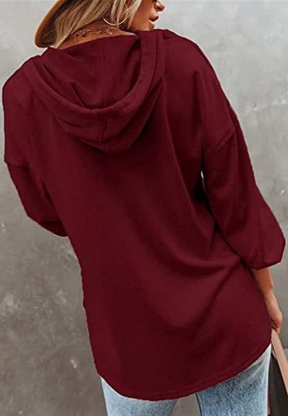 Sudadera con capucha y detalle de botones