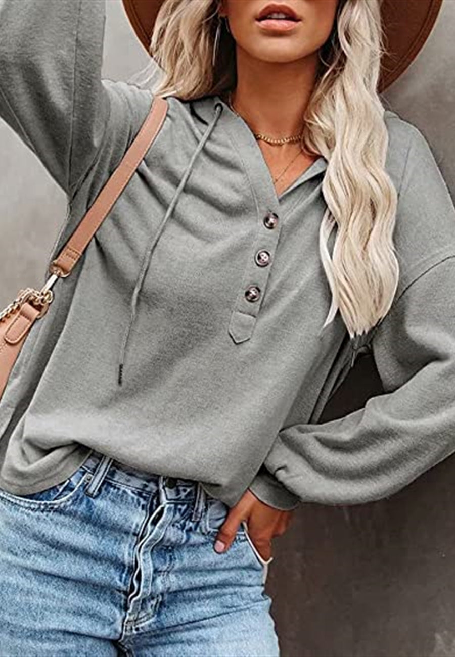 Sudadera con capucha y detalle de botones