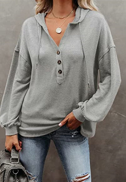 Sudadera con capucha y detalle de botones
