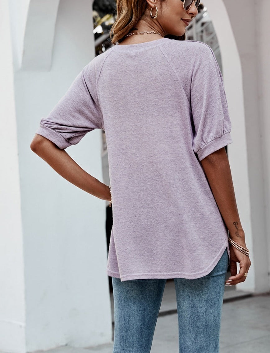 Blusa informal con mangas abotonadas en contraste