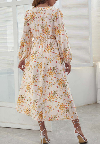 Vestido midi floral con escote cruzado