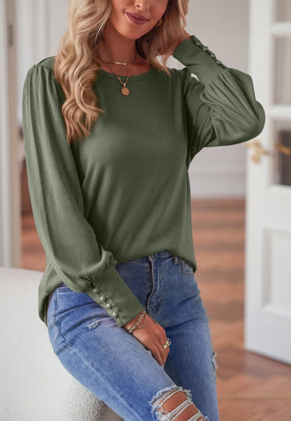 Blusa con puños abotonados en color liso 