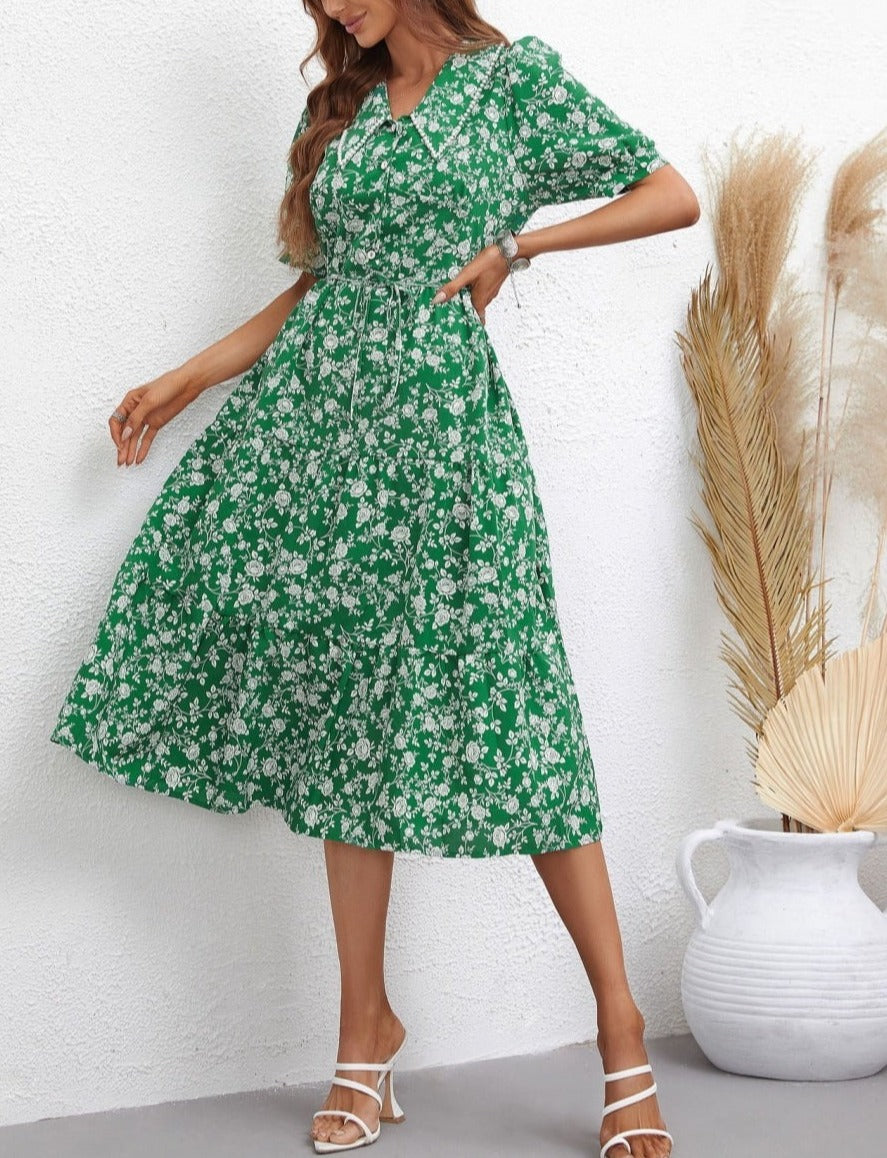 Vestido con cuello y mangas abullonadas con estampado floral
