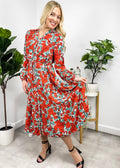 Vestido con botones y flores en escote en V 