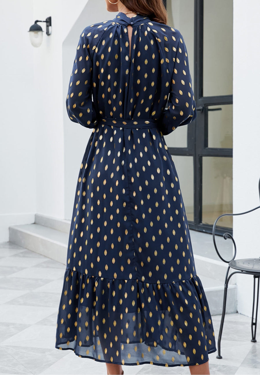 Vestido largo de manga larga con estampado de lunares 