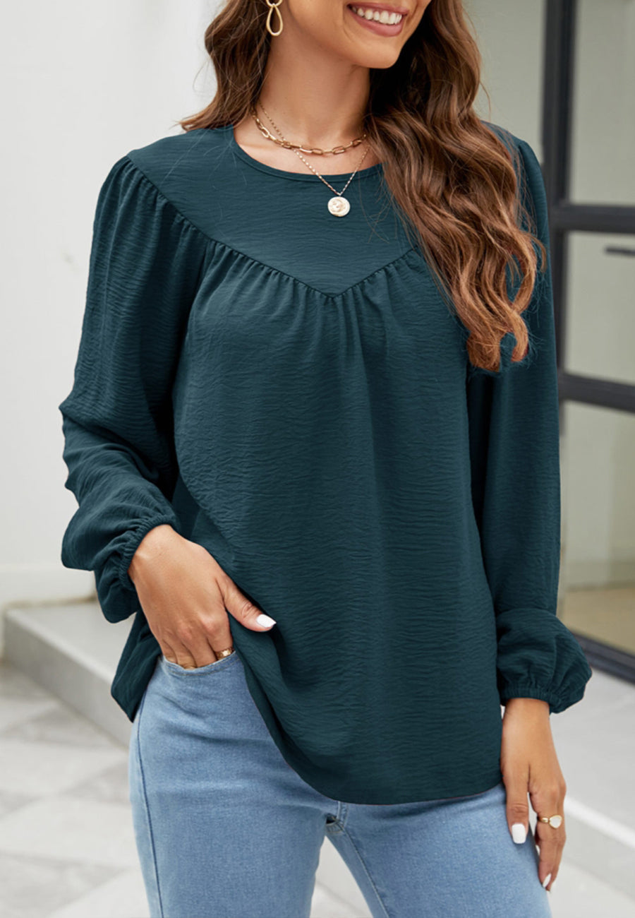 Blusa con volantes en forma de V 