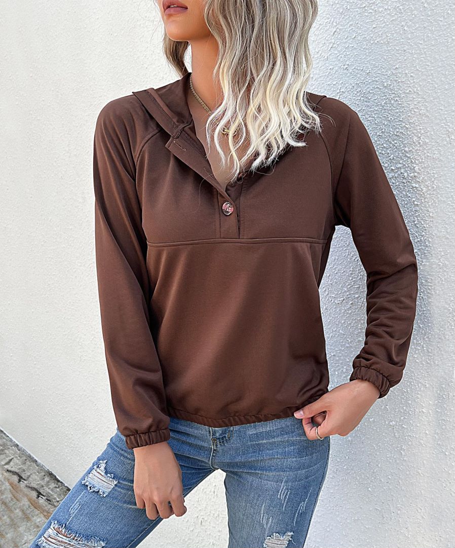 Sudadera con capucha y medio botón 