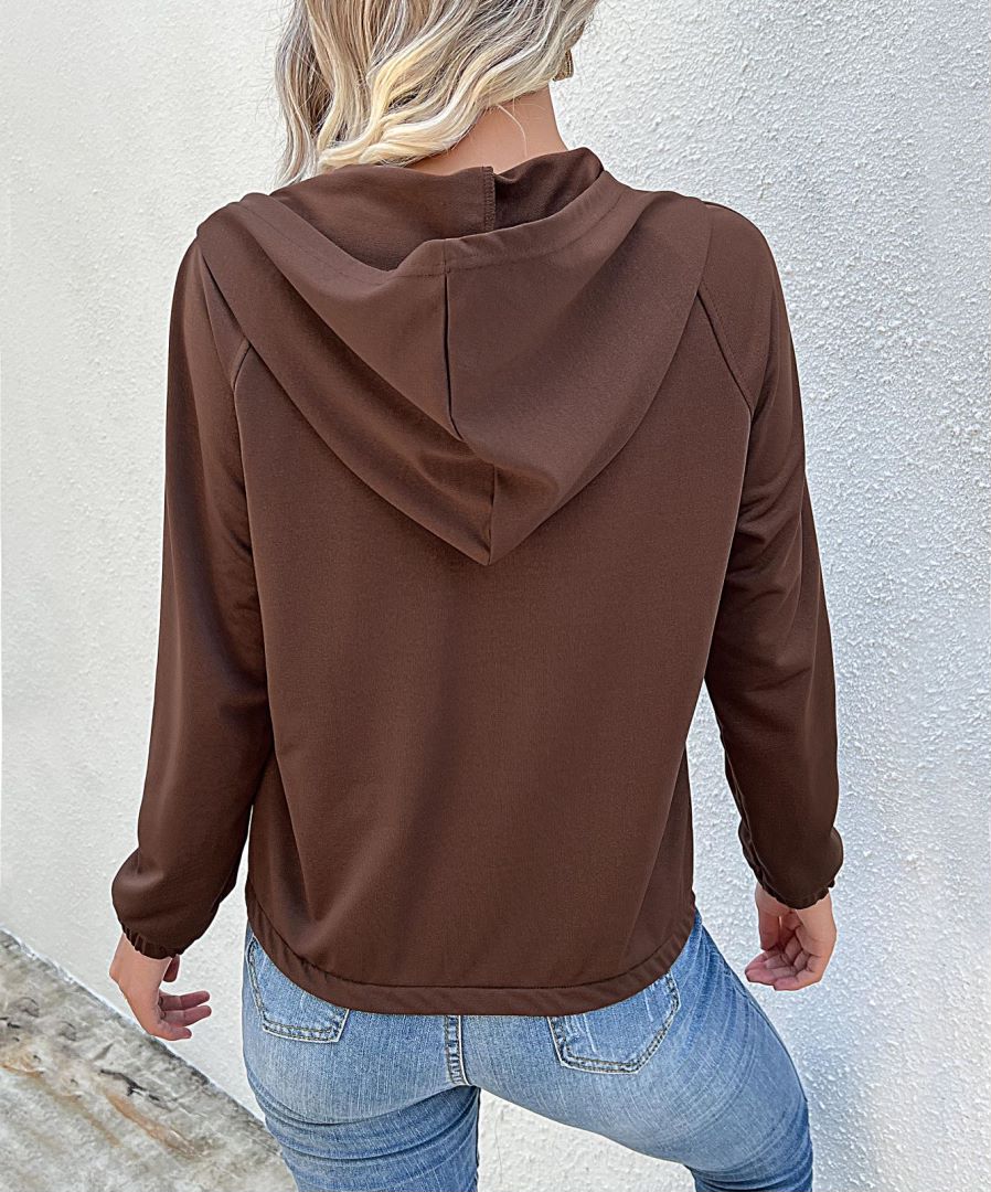 Sudadera con capucha y medio botón 