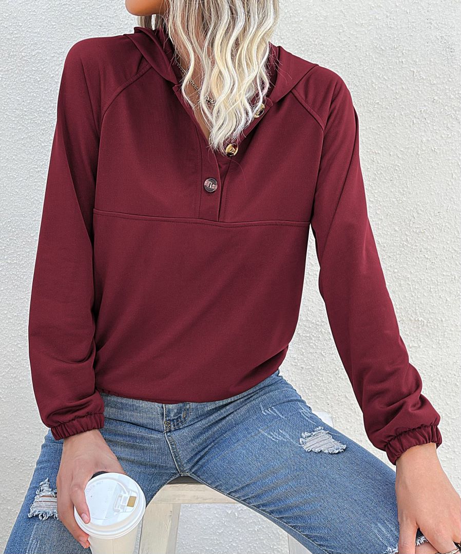 Sudadera con capucha y medio botón 