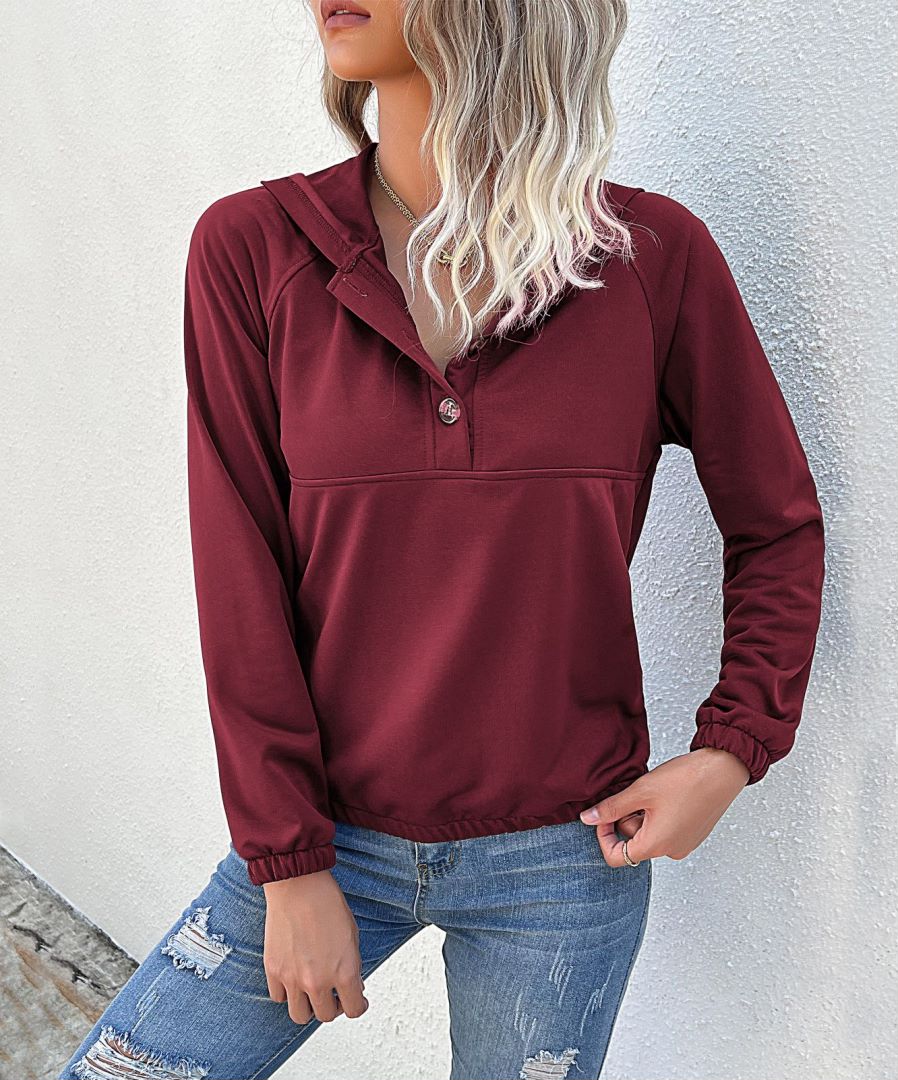 Sudadera con capucha y medio botón 