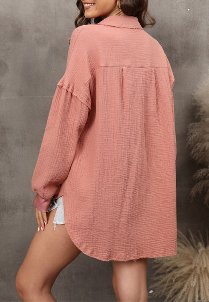 Blusa con hombros caídos y dobladillo redondeado 