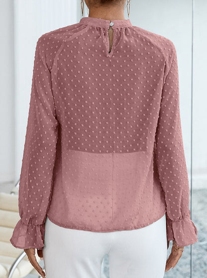 Blusa de lunares suizos con cuello alto