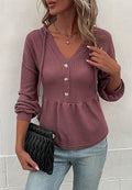 Suéter de punto peplum con capucha
