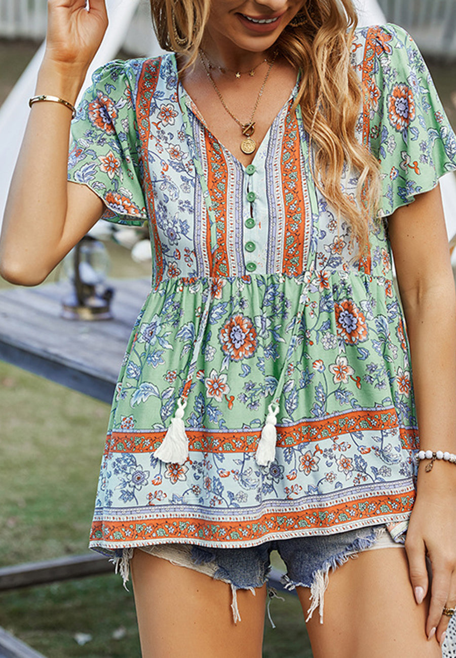 Blusa bohemia con escote en V y lazo y peplum