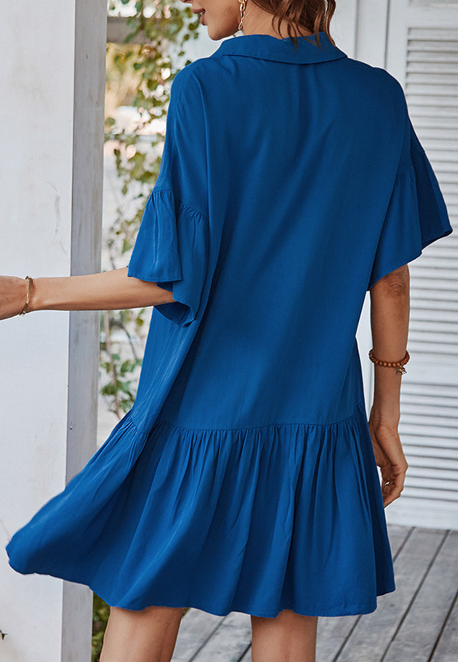 Vestido asimétrico con volantes y botones