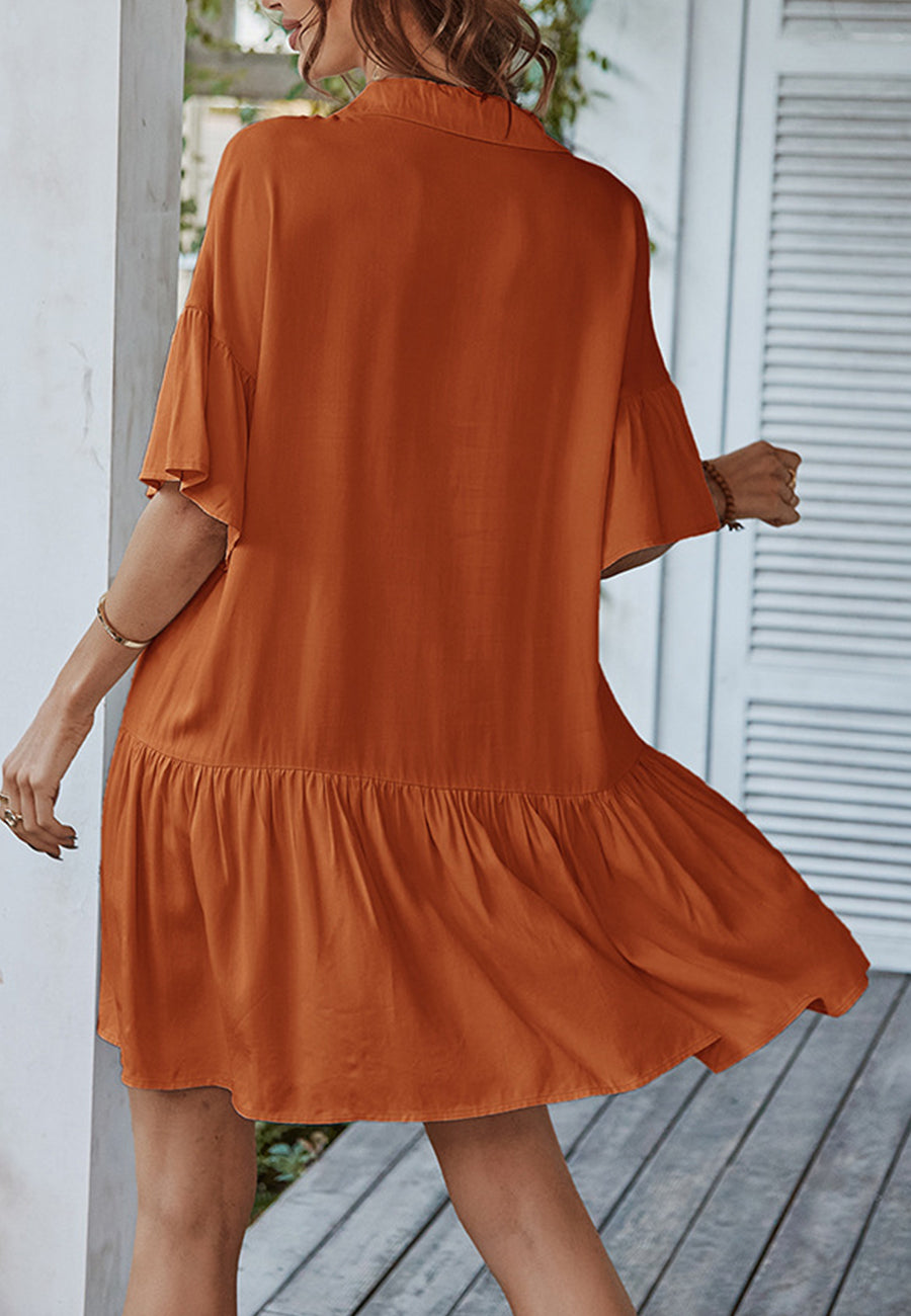 Vestido asimétrico con volantes y botones