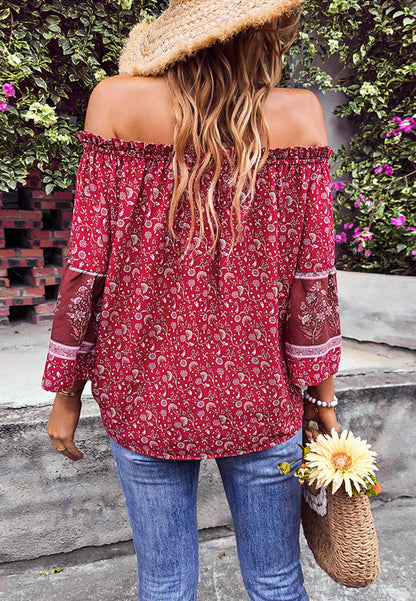Blusa con borlas y hombros descubiertos
