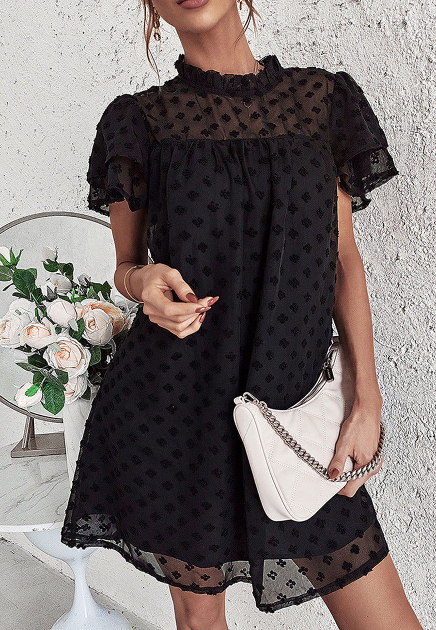Vestido con mangas abullonadas y capas