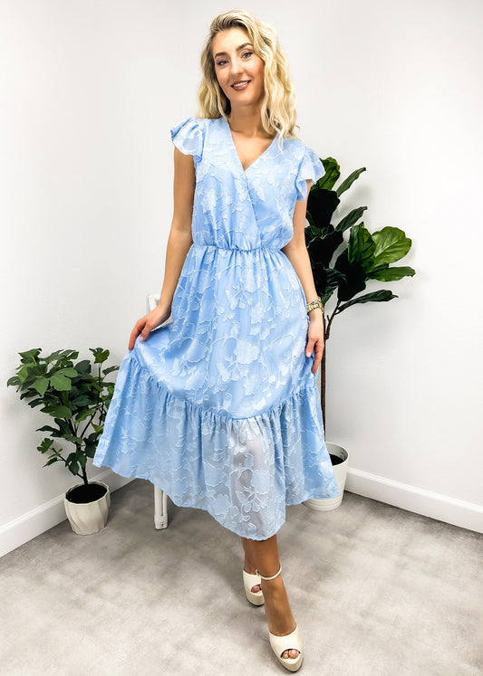 Vestido con mangas abullonadas y estampado floral