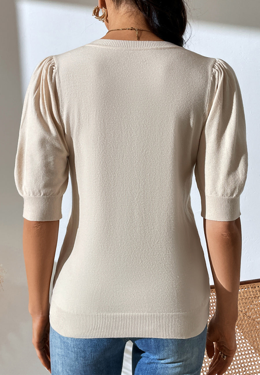 Suéter de color liso con mangas hasta el codo