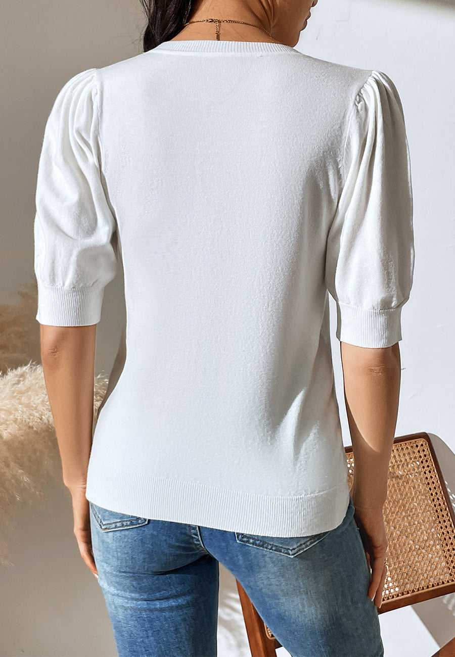 Suéter de color liso con mangas hasta el codo