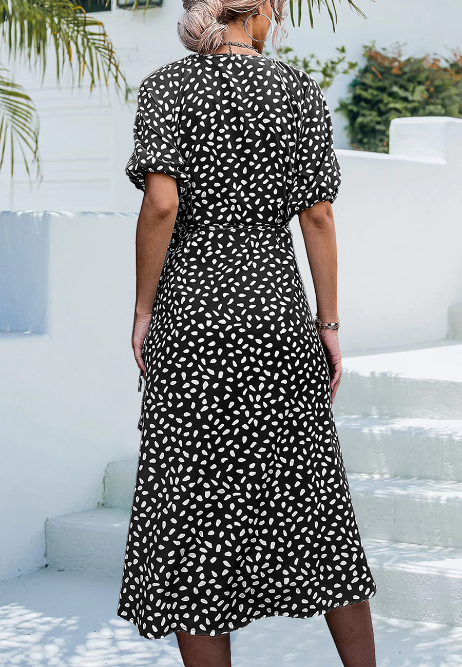 Vestido cruzado con mangas abullonadas y estampado de guepardo 