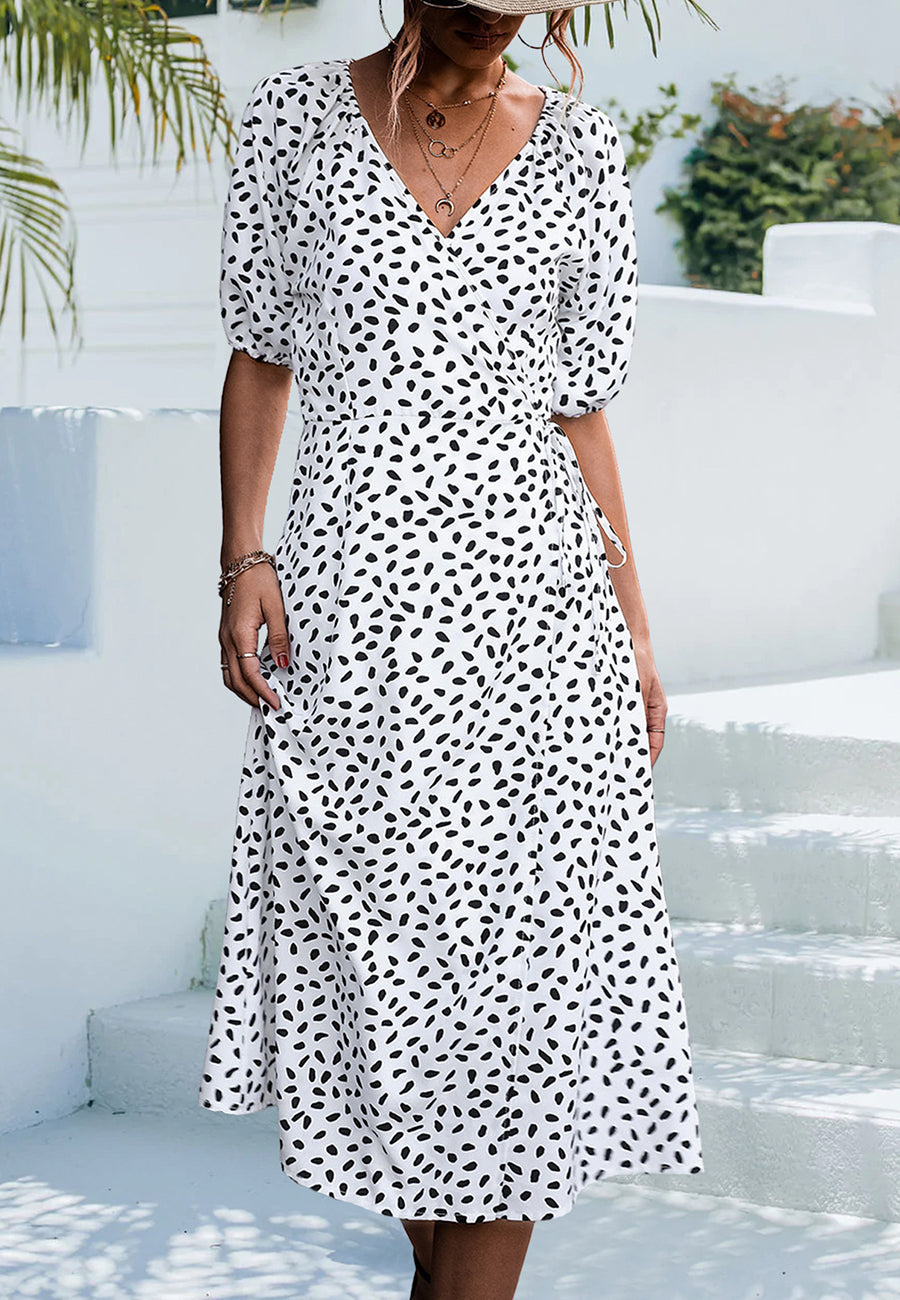 Vestido cruzado con mangas abullonadas y estampado de guepardo 
