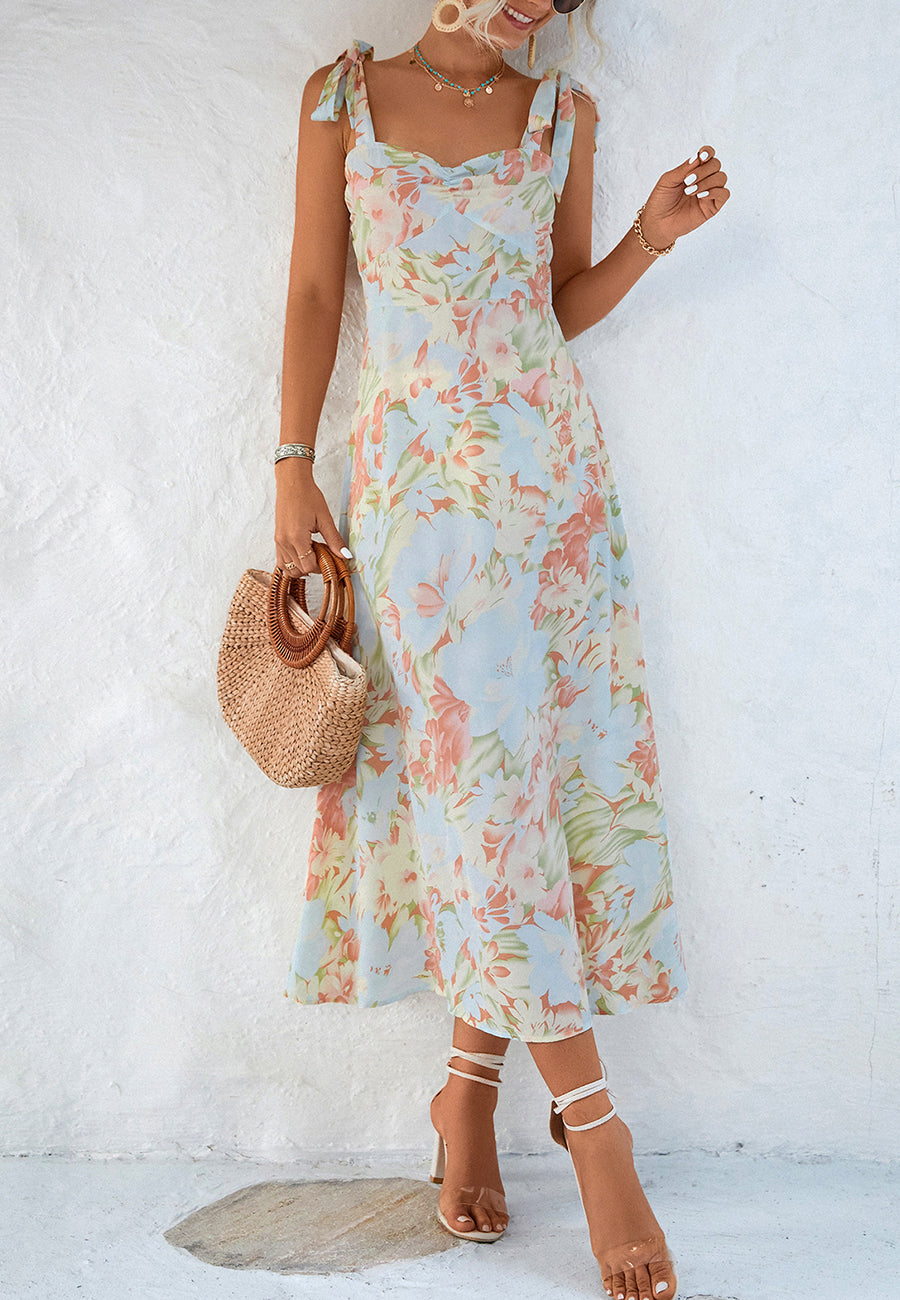Vestido con lazo en los hombros y estampado floral en tonos pastel