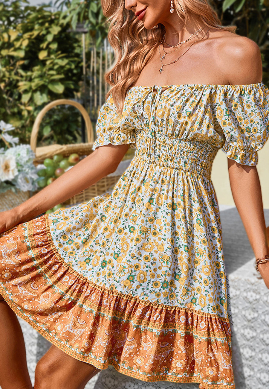 Vestido con hombros descubiertos y mangas abullonadas