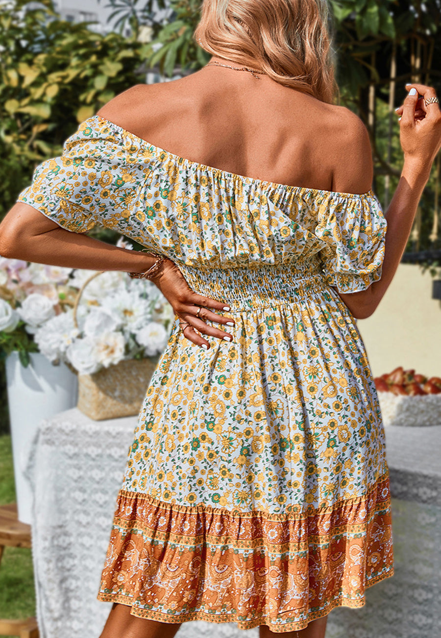 Vestido con hombros descubiertos y mangas abullonadas