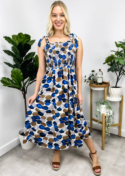 Vestido fruncido con estampado y lazo en los hombros 