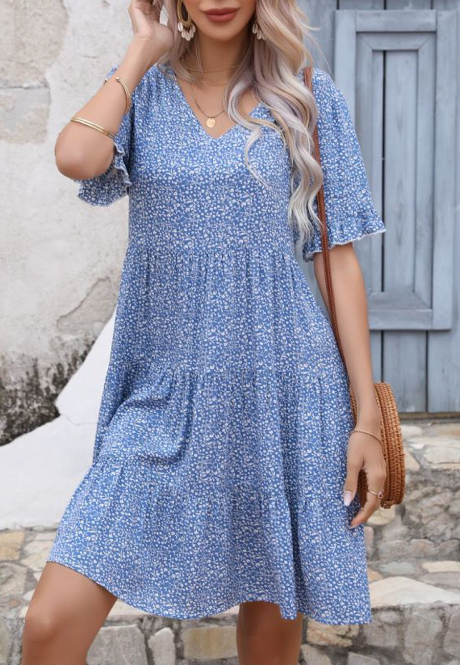 Vestido de manga corta con volantes florales