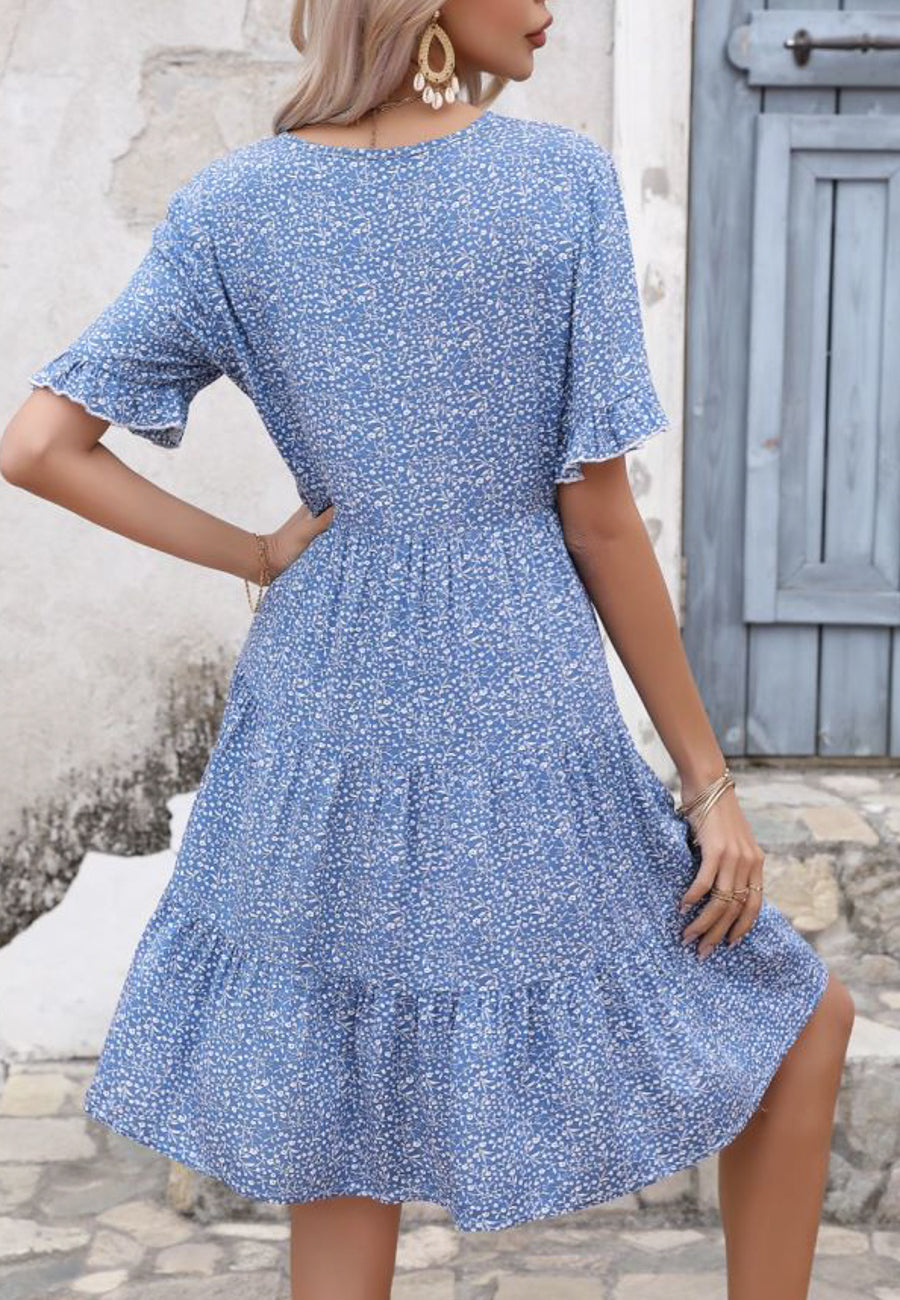 Vestido de manga corta con volantes florales