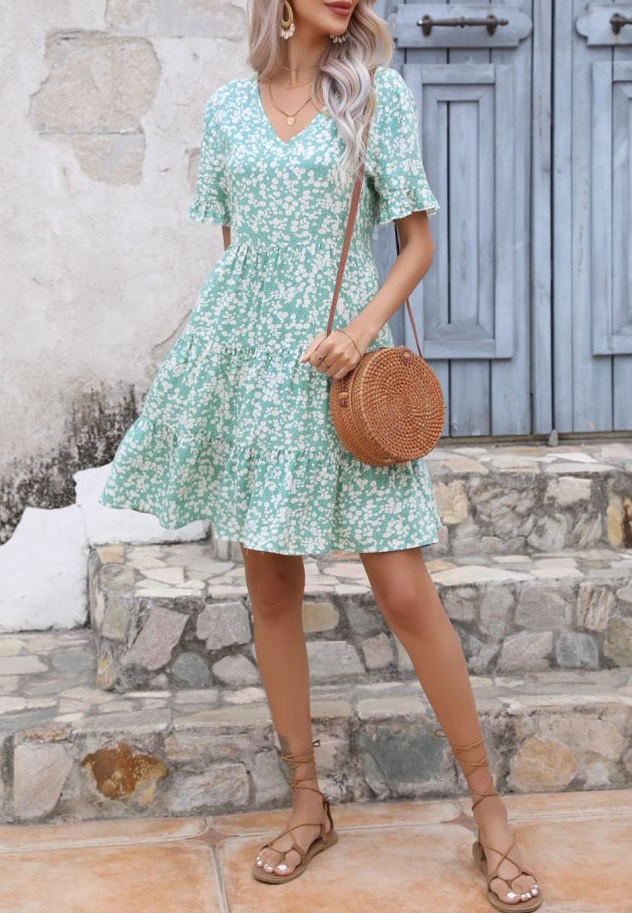 Vestido de manga corta con volantes florales