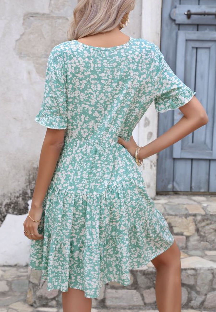 Vestido de manga corta con volantes florales
